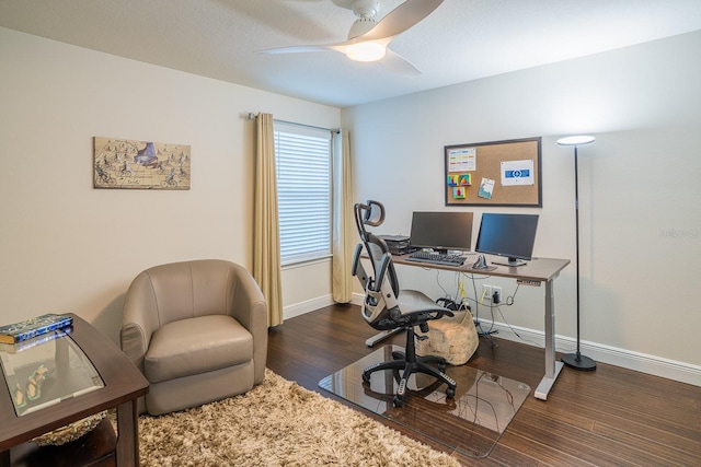 office area featuring dark wood-type flooring and ceiling fan