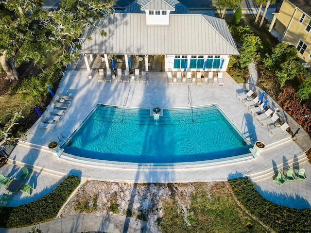 view of swimming pool featuring a patio