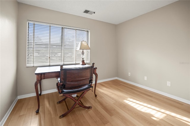 home office featuring light hardwood / wood-style flooring