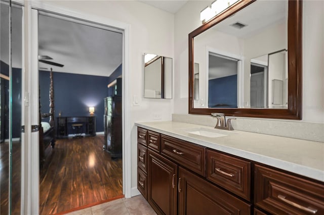 bathroom featuring tile patterned floors and vanity