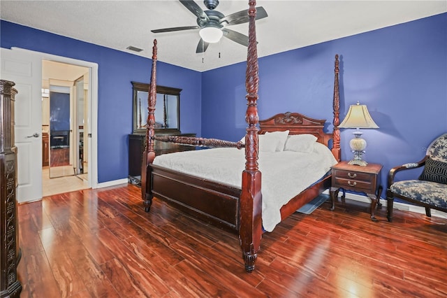 bedroom featuring hardwood / wood-style flooring and ceiling fan