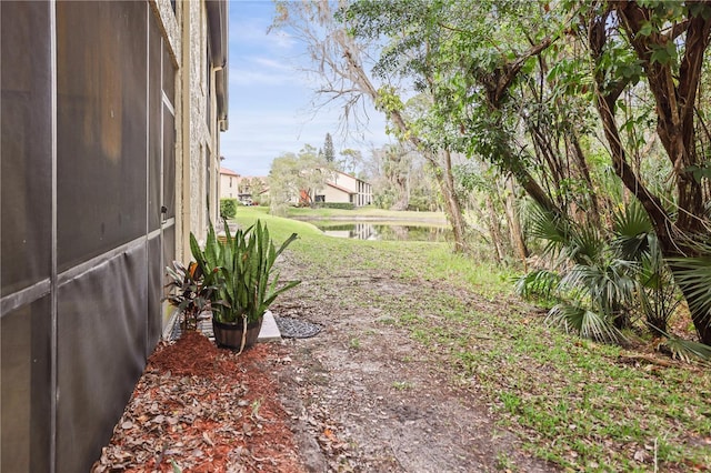 view of yard with a water view