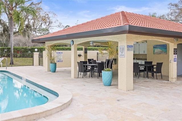 view of pool featuring a gazebo, a patio, and ceiling fan