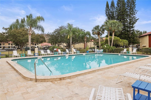 view of pool featuring a patio