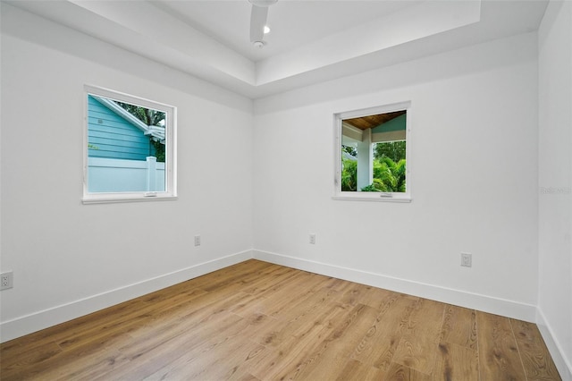 spare room with light hardwood / wood-style floors