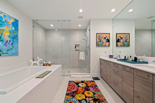 bathroom featuring tile patterned floors, vanity, and independent shower and bath