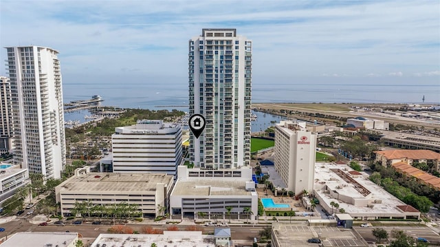 birds eye view of property featuring a water view