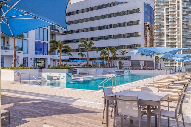 view of swimming pool featuring a patio