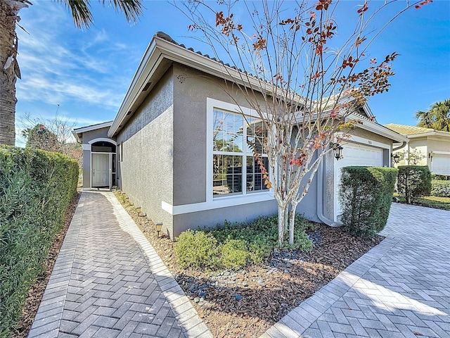 view of home's exterior with a garage