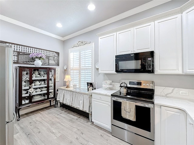 kitchen with ornamental molding, white cabinets, and stainless steel electric range