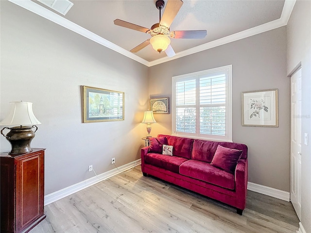 sitting room featuring crown molding, ceiling fan, and light hardwood / wood-style floors