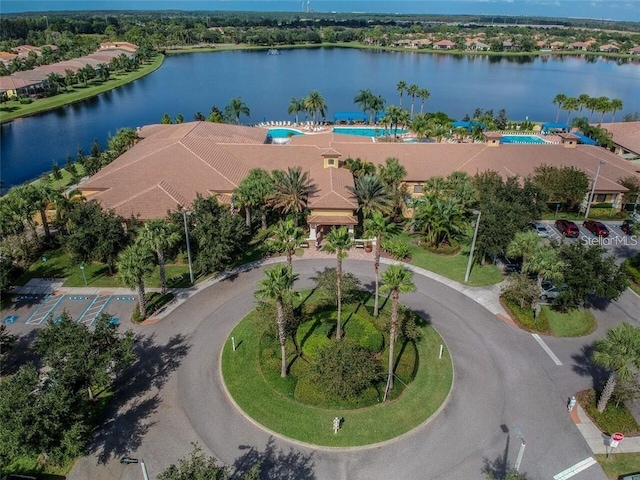 drone / aerial view with a water view