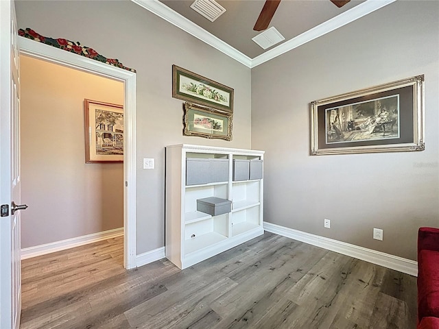 15856 Cobble Mill Dr, Wimauma, FL 33598 - interior space featuring crown molding, wood finished floors, and ceiling fan