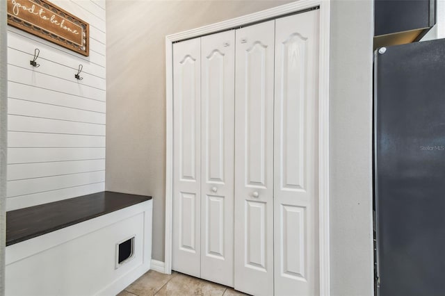 mudroom featuring light tile patterned floors