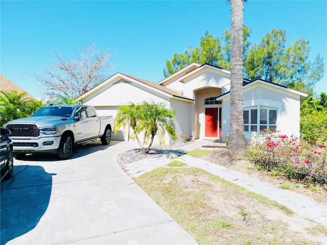 view of front of property featuring a garage