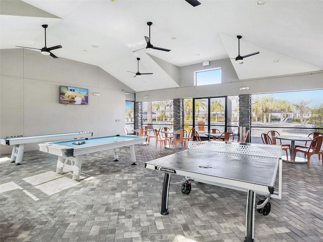 game room with ceiling fan, pool table, and high vaulted ceiling