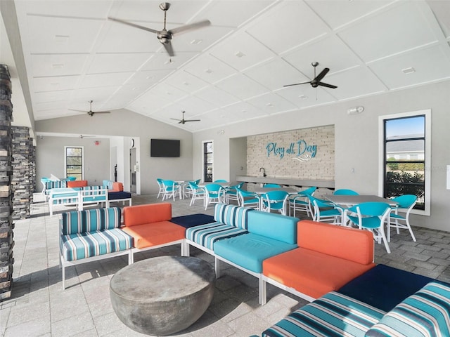 view of patio / terrace featuring outdoor dining area, ceiling fan, and an outdoor hangout area