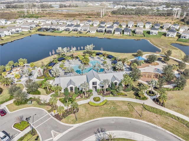 aerial view with a water view and a residential view