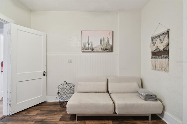 sitting room featuring dark hardwood / wood-style flooring