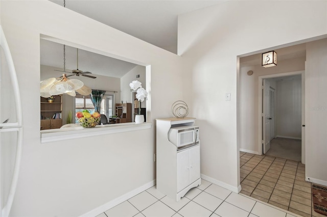 kitchen featuring light tile patterned flooring