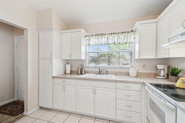 kitchen with white cabinetry, white electric range oven, light tile patterned flooring, and sink