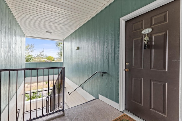 entrance to property featuring a balcony