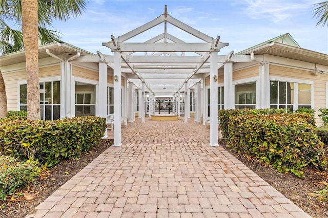 view of home's community featuring a pergola