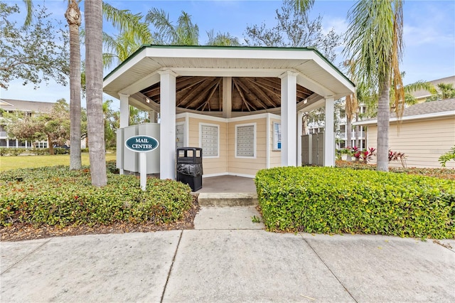 view of property's community with a carport