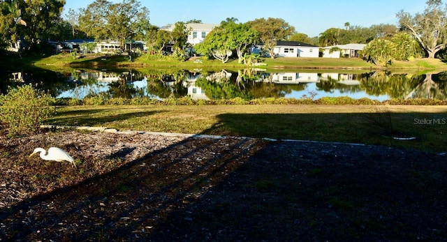 view of yard with a water view