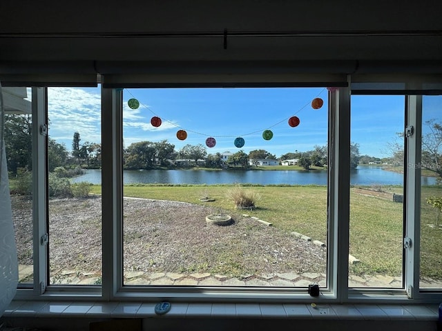 entryway featuring a water view