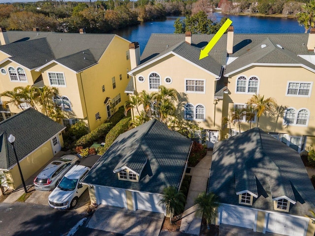 drone / aerial view featuring a water view