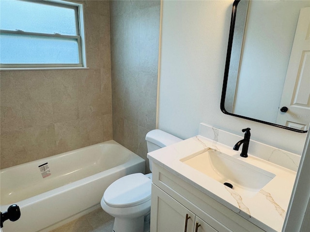 full bathroom with tiled shower / bath combo, vanity, and toilet