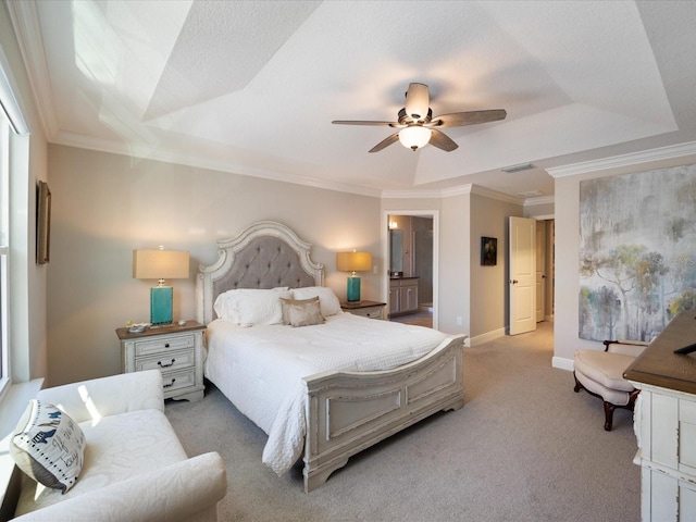 bedroom featuring light carpet, ornamental molding, a raised ceiling, and ceiling fan