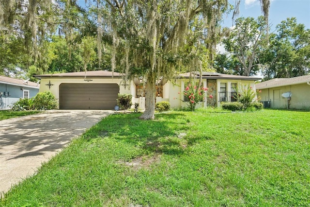 single story home featuring a garage, a front yard, and solar panels