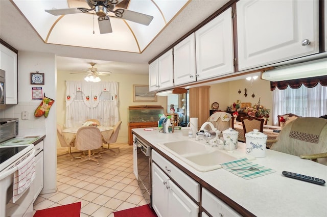 kitchen with electric stove, sink, white cabinetry, backsplash, and black dishwasher