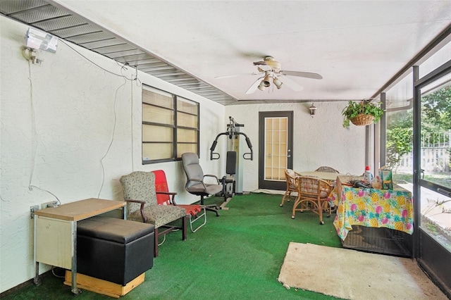 sunroom / solarium with ceiling fan