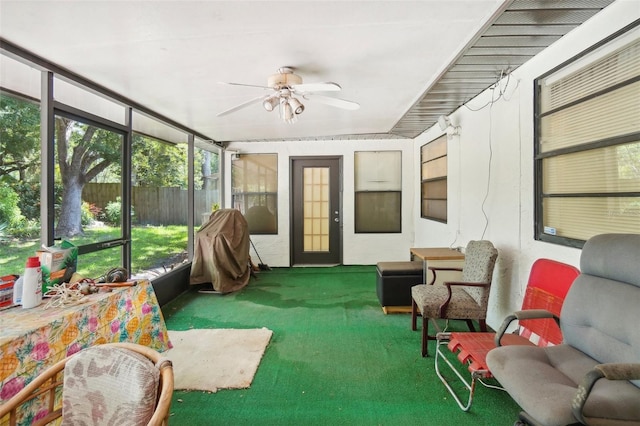 sunroom / solarium with ceiling fan