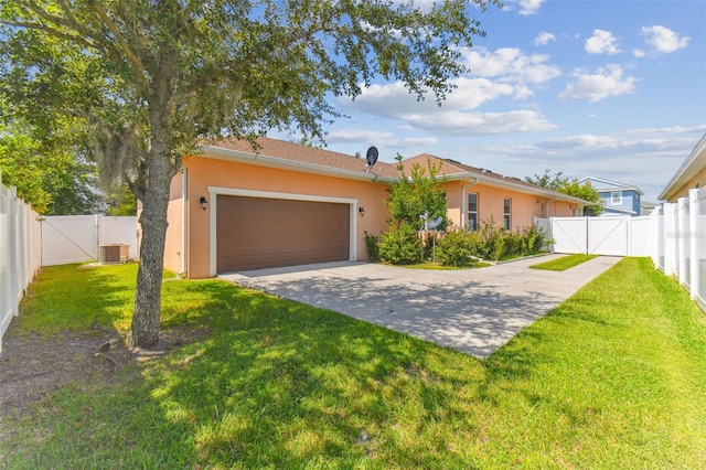 ranch-style house featuring cooling unit, a garage, and a front lawn