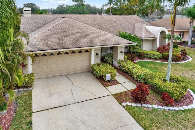 ranch-style home with a garage