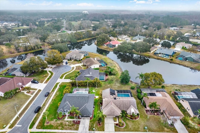 drone / aerial view featuring a water view