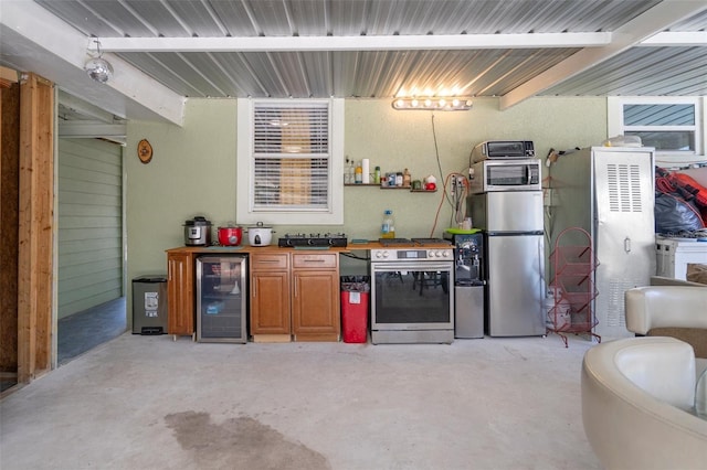 kitchen featuring beverage cooler and stainless steel refrigerator