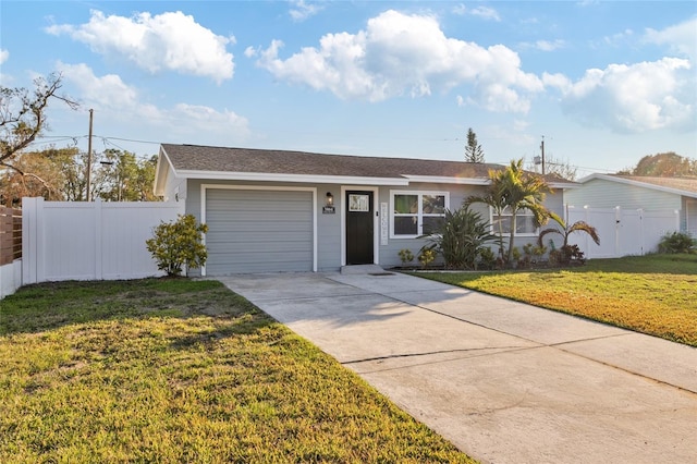 single story home with a garage and a front yard