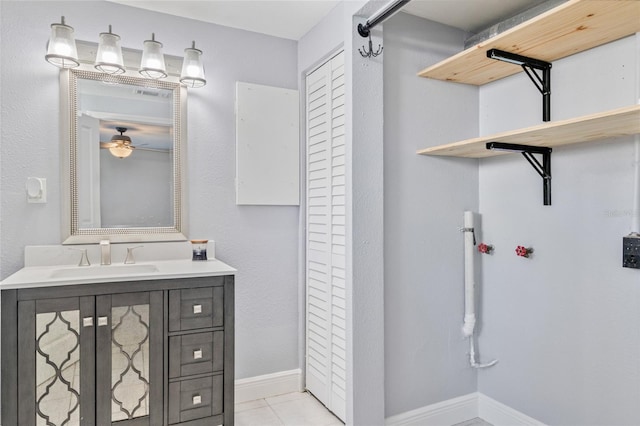 bathroom featuring vanity, tile patterned floors, and ceiling fan