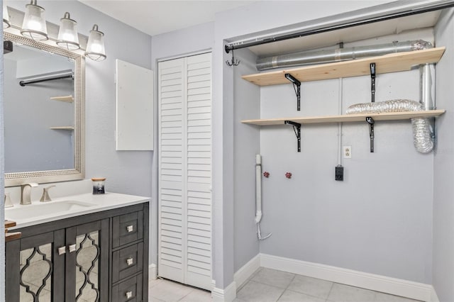 bathroom featuring vanity and tile patterned flooring