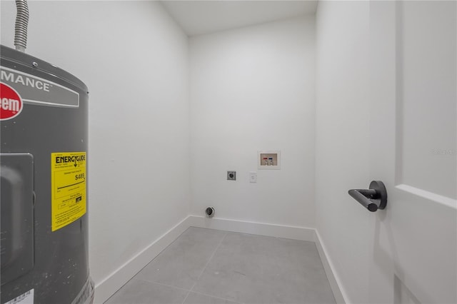 washroom featuring electric dryer hookup, washer hookup, and light tile patterned floors