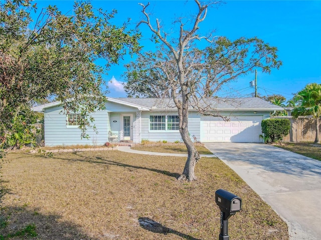 single story home with a garage and a front yard