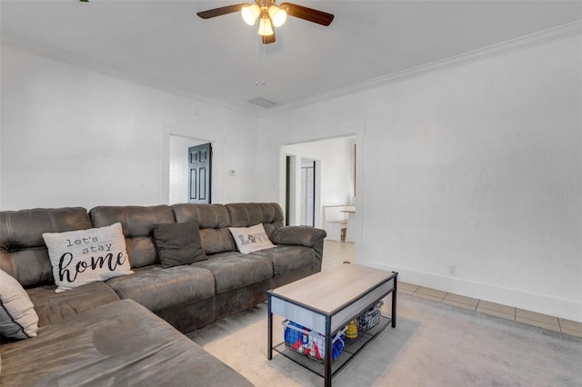 tiled living room featuring ornamental molding and ceiling fan