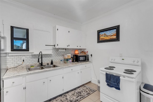 kitchen with light tile patterned flooring, sink, white cabinets, white range with electric stovetop, and backsplash