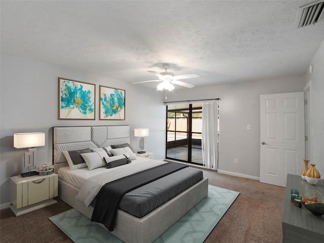 carpeted bedroom featuring ceiling fan, a textured ceiling, and access to outside