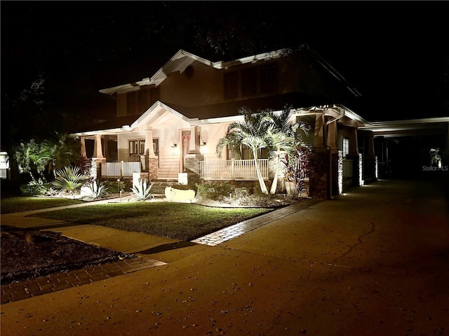 craftsman house featuring a carport